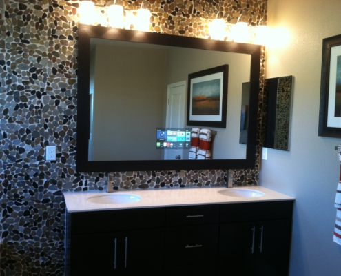 Bathroom mirror with built in Control4 navigation panel